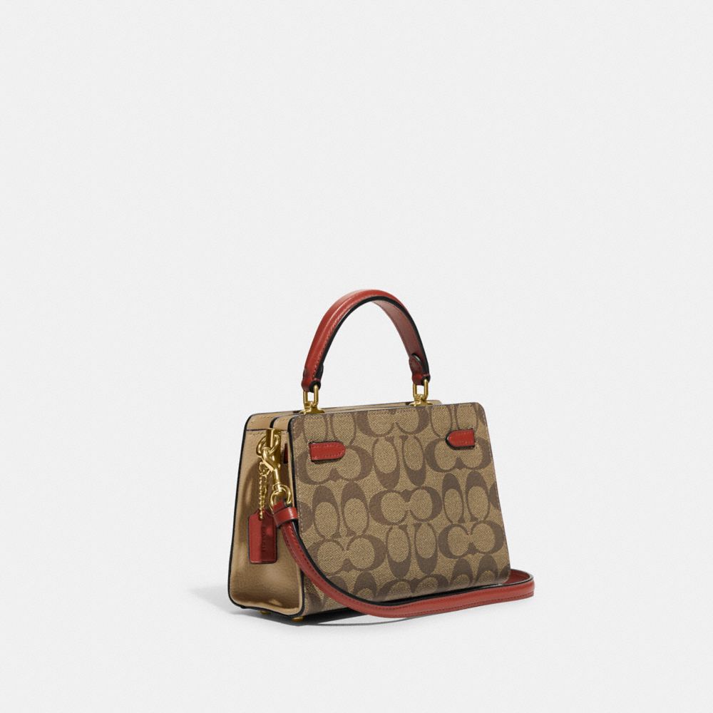 Coach Mini Lane - $285 . Signature coated canvas, refined pebble