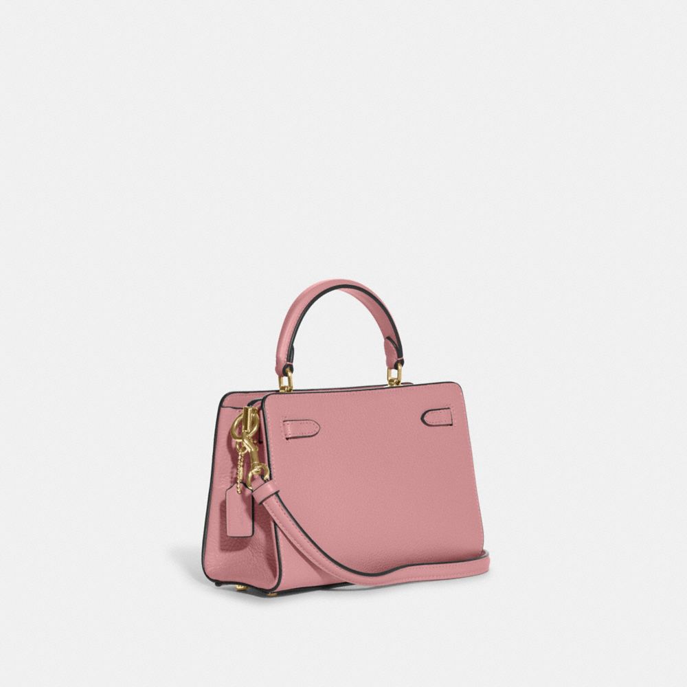 Pink and best sale white coach bag