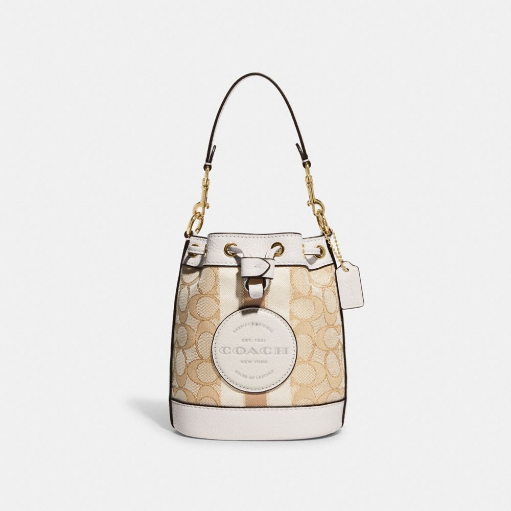 COACH®,MINI DEMPSEY BUCKET BAG IN SIGNATURE JACQUARD WITH STRIPE AND COACH PATCH,Non Leather,Mini,Anniversary,Gold/Light Khaki Chalk,Front View