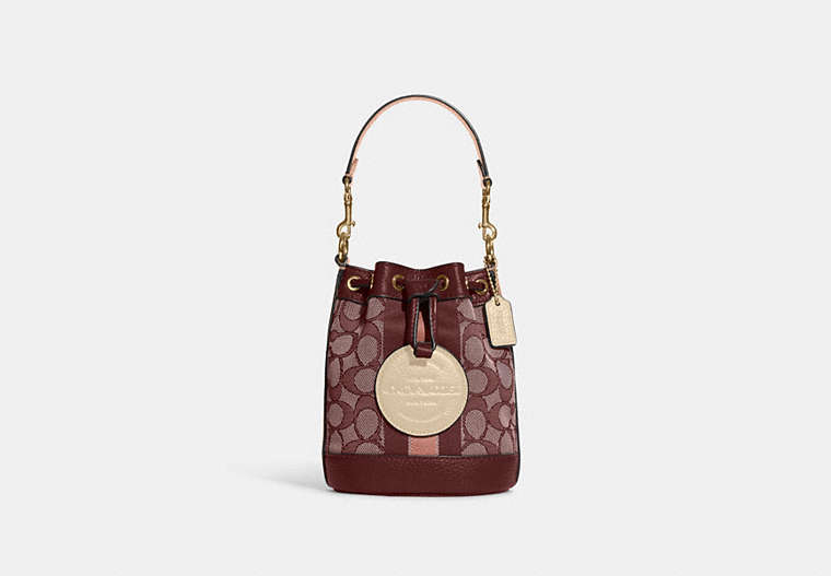 COACH®,MINI DEMPSEY BUCKET BAG IN SIGNATURE JACQUARD WITH STRIPE AND COACH PATCH,Jacquard,Mini,Anniversary,Gold/Wine Multi,Front View