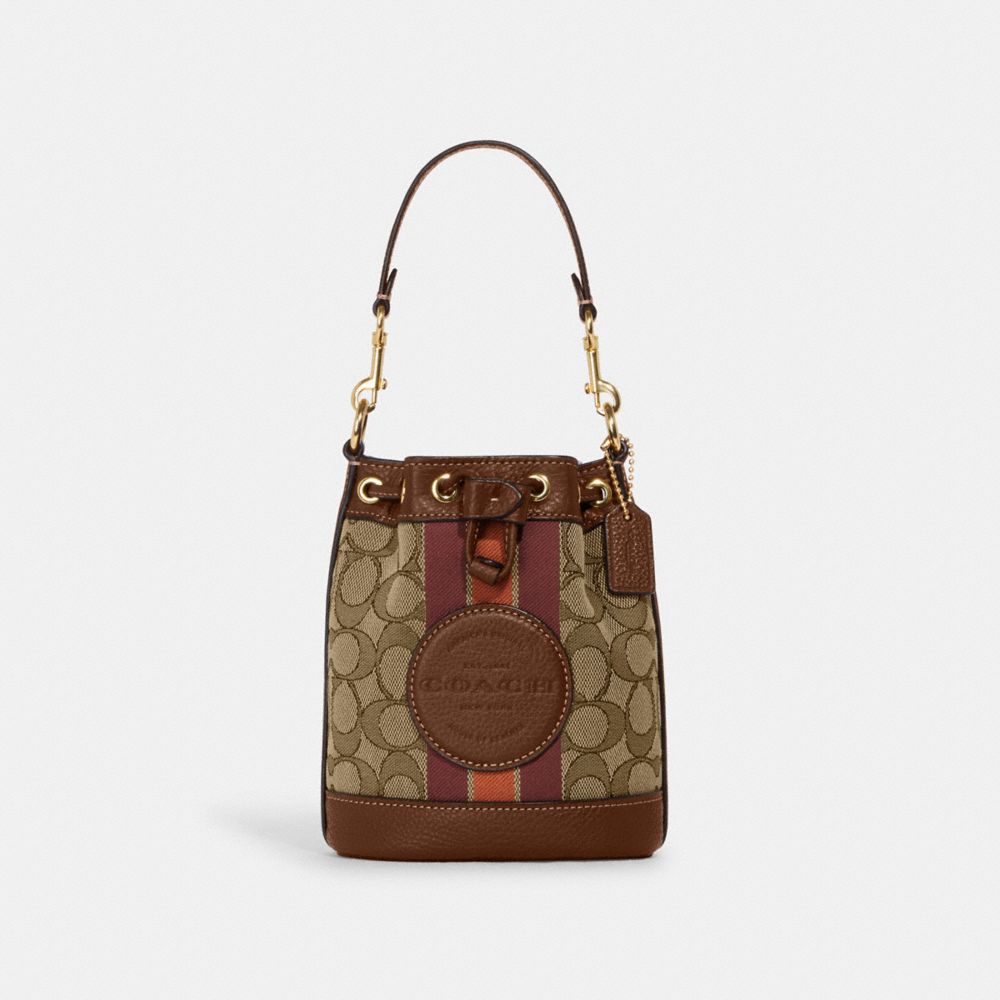 COACH®,MINI DEMPSEY BUCKET BAG IN SIGNATURE JACQUARD WITH STRIPE AND COACH PATCH,Non Leather,Mini,Anniversary,Im/Khaki/Saddle Multi,Front View