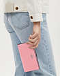 COACH®,SLIM ZIP WALLET,Pebbled Leather,Silver/Flower Pink,Detail View