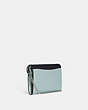 COACH®,TAMMIE CLUTCH CROSSBODY IN COLORBLOCK,Silver/Light Teal/ Midnight Multi,Angle View
