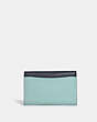 COACH®,TAMMIE CLUTCH CROSSBODY IN COLORBLOCK,Silver/Light Teal/ Midnight Multi,Back View
