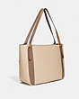 COACH®,ALANA TOTE IN COLORBLOCK,Refined Pebble Leather,X-Large,Brass/Ivory Multi,Angle View