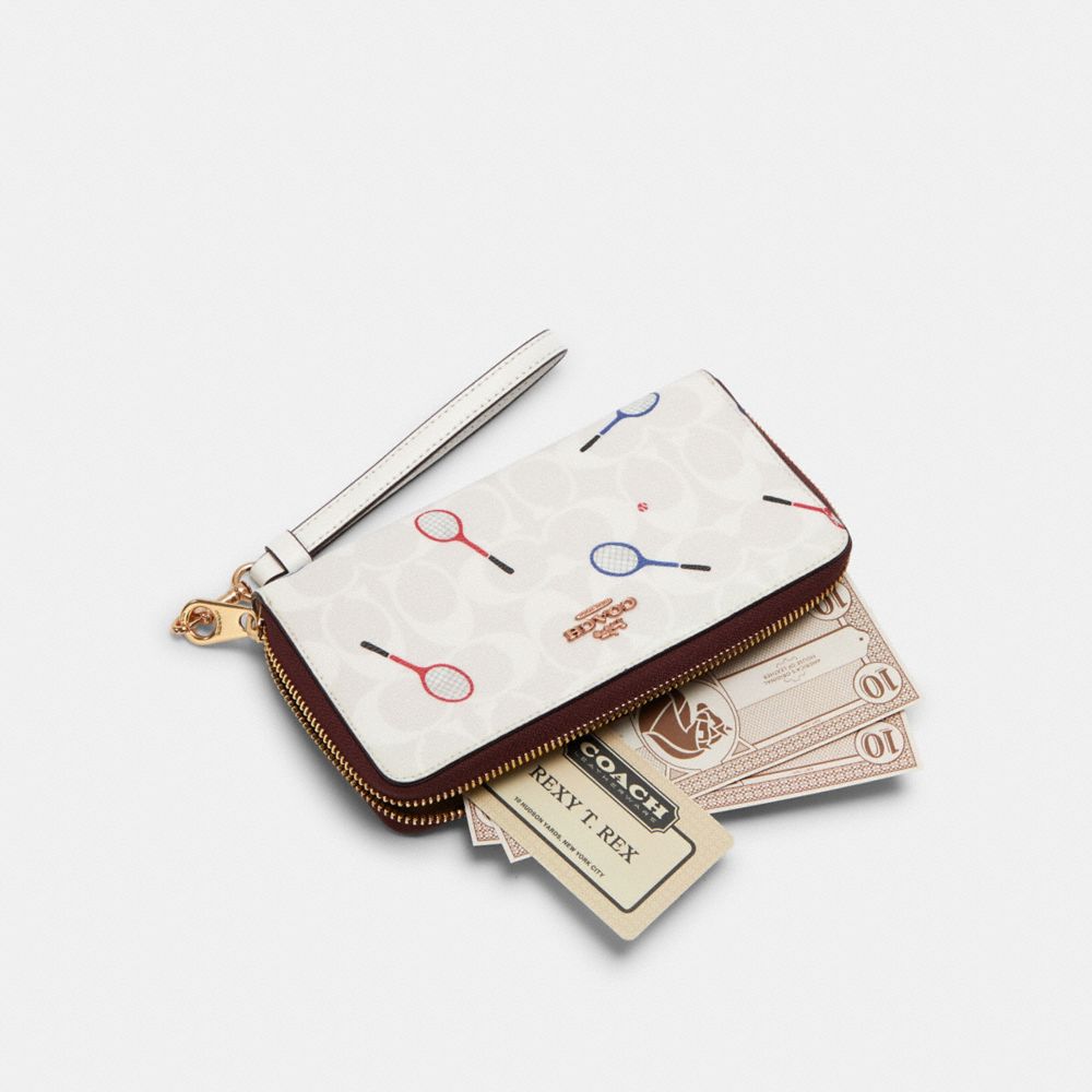 COACH OUTLET® | Long Zip Around Wallet In Signature Canvas With