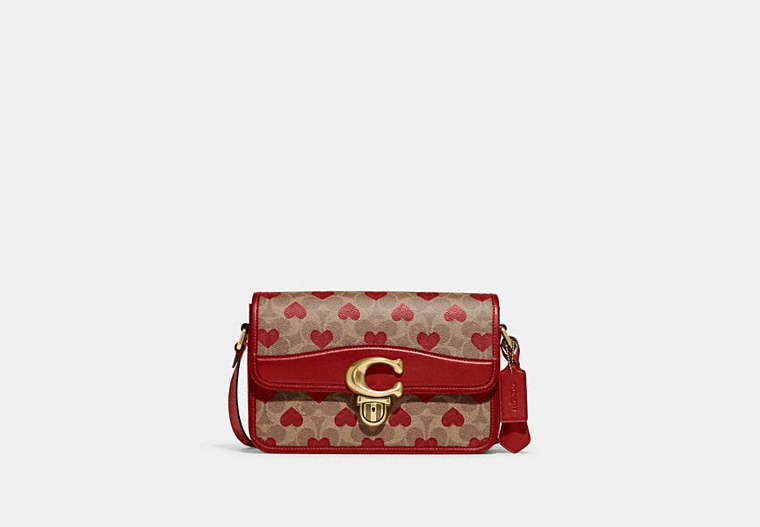 COACH®,STUDIO SHOULDER BAG IN SIGNATURE CANVAS WITH HEART PRINT,Signature Coated Canvas/Smooth Leather,Small,Brass/Tan Red Apple,Front View
