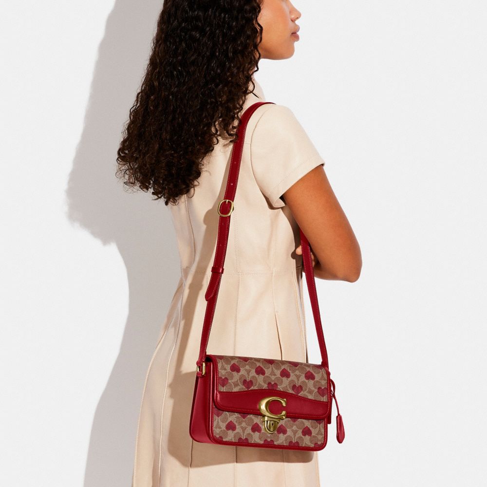 Studio Shoulder Bag In Signature Canvas With Heart Print