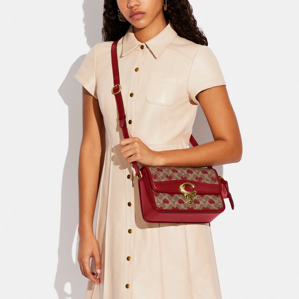 Studio Shoulder Bag In Signature Canvas With Heart Print