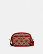 COACH®,CAMERA BAG IN SIGNATURE CANVAS WITH HEART PRINT,Signature Coated Canvas/Pebble Leather,Small,Brass/Tan Red Apple,Front View