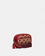 COACH®,CAMERA BAG IN SIGNATURE CANVAS WITH HEART PRINT,Signature Coated Canvas/Pebble Leather,Small,Brass/Tan Red Apple,Angle View