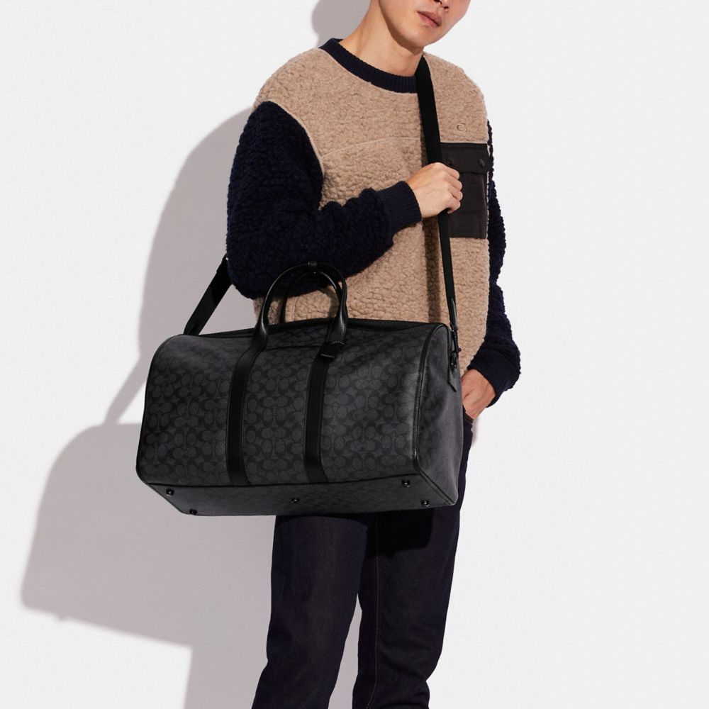 Coach signature duffle sale