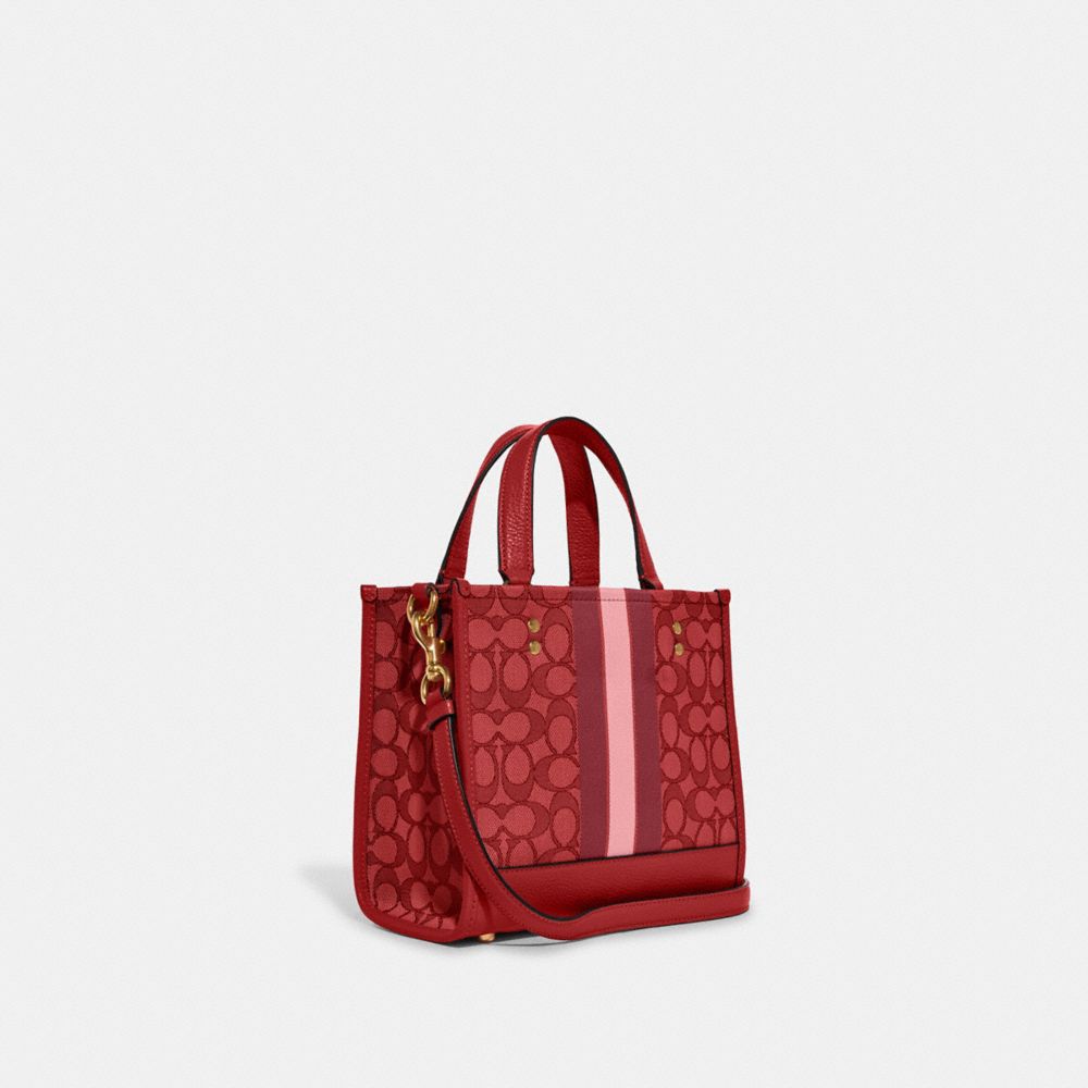 COACH®,DEMPSEY TOTE BAG IN SIGNATURE JACQUARD WITH STRIPE AND COACH PATCH,Medium,Anniversary,Gold/Red Apple Multi,Angle View