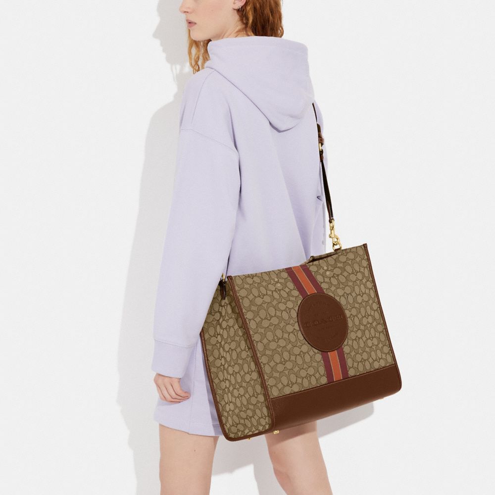 COACH®,Dempsey Tote Bag 40 In Signature Jacquard With Stripe And Coach Patch,,Detail View
