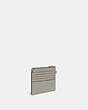 COACH®,L-ZIP WRISTLET,Polished Pebble Leather,Mini,Brass/Dove Grey,Angle View