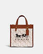 COACH®,FIELD TOTE 22 WITH HORSE AND CARRIAGE PRINT AND CARRIAGE BADGE,Printed Coated Canvas,Medium,Brass/Chalk Burnished Amber,Front View