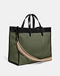 COACH®,FIELD TOTE BAG 40 IN ORGANIC COTTON CANVAS WITH COACH BADGE,Organic Cotton,X-Large,Army Green/Black Copper,Angle View