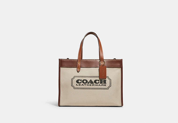 COACH®,FIELD TOTE 30 WITH COACH BADGE,Large,Brass/Dark Natural Multi,Front View