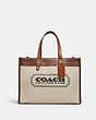 COACH®,FIELD TOTE 30 WITH COACH BADGE,Large,Brass/Dark Natural Multi,Front View