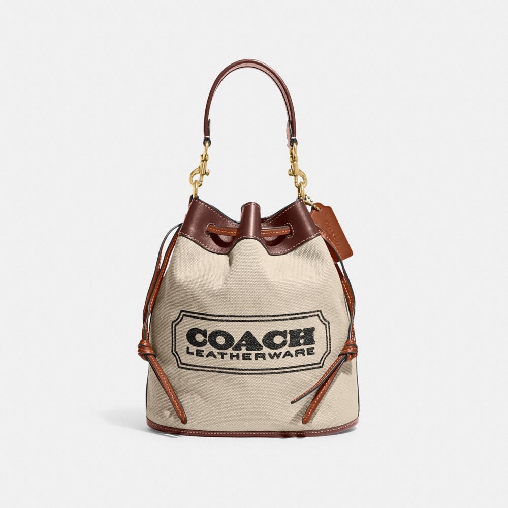 新品】コーチ COACH バケット バッグ ウィズ グロメッツ - かごバッグ