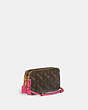 COACH®,KIRA CROSSBODY BAG WITH HORSE AND CARRIAGE PRINT,Printed Coated Canvas,Mini,Brass/Truffle Petunia,Angle View
