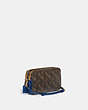COACH®,KIRA CROSSBODY BAG WITH HORSE AND CARRIAGE PRINT,Printed Coated Canvas,Mini,Brass/Truffle Fin Blue,Angle View