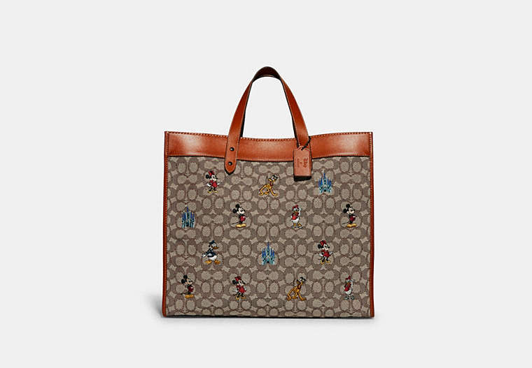 COACH®,DISNEY X COACH FIELD TOTE 40 IN SIGNATURE TEXTILE JACQUARD WITH MICKEY MOUSE AND FRIENDS EMBROIDERY,Signa...,0 V/Cocoa,Front View