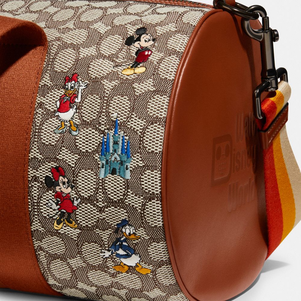 COACH®  Disney X Coach Nolita 19 In Signature Jacquard With Mickey Mouse  Print