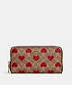 COACH®,ACCORDION ZIP WALLET IN SIGNATURE CANVAS WITH HEART PRINT,Signature Coated Canvas,Mini,Brass/Tan Red Apple,Front View