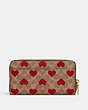 COACH®,ACCORDION ZIP WALLET IN SIGNATURE CANVAS WITH HEART PRINT,Signature Coated Canvas,Mini,Brass/Tan Red Apple,Back View
