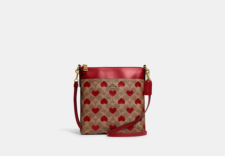 COACH®,KITT MESSENGER CROSSBODY IN SIGNATURE CANVAS WITH HEART PRINT,Signature Coated Canvas/Smooth Leather,Small,Brass/Tan Red Apple,Front View