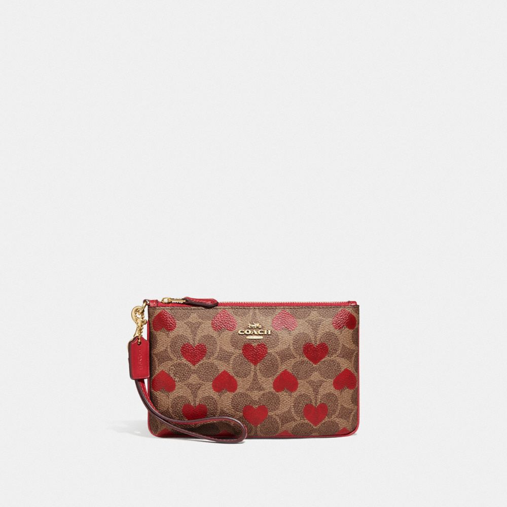 COACH® | Small Wristlet In Signature Canvas With Heart Print