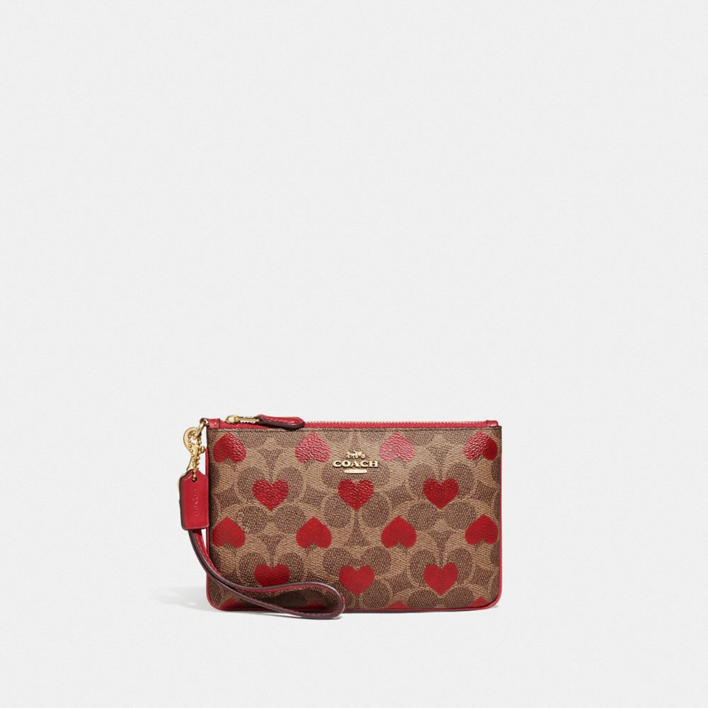 NEW WITH TAGS Coach Wristlet Pink Red Hearts 