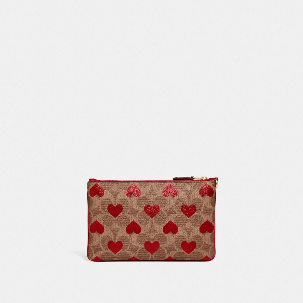 Small Wristlet In Signature Canvas With Heart Print