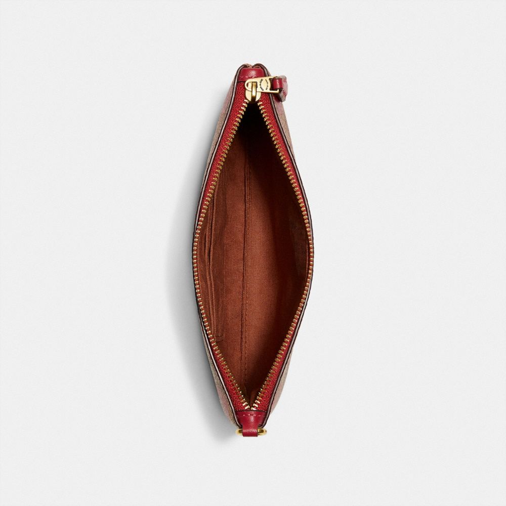 Small Wristlet In Signature Canvas With Heart Print