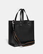 COACH®,DISNEY X COACH FIELD TOTE WITH WALT DISNEY WORLD MOTIF,Polished Pebble Leather,Large,Silver/Black,Angle View