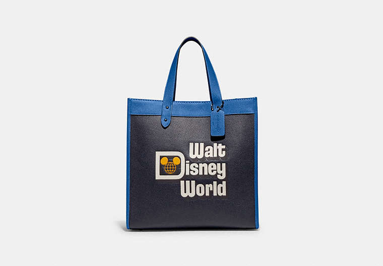 COACH®,DISNEY X COACH FIELD TOTE WITH WALT DISNEY WORLD MOTIF,Polished Pebble Leather,Large,Pewter/Midnight Navy Multi,Front View