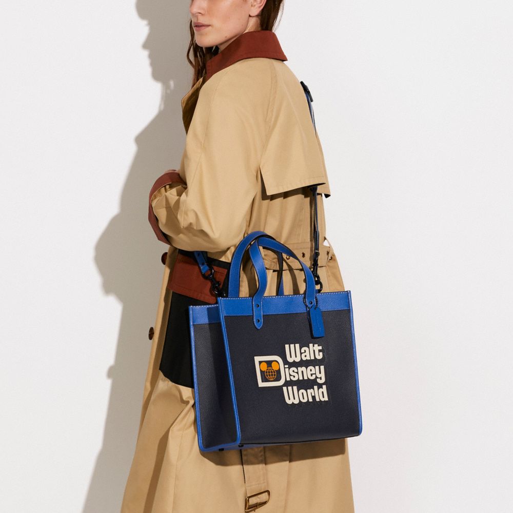 COACH®,Disney X Coach Field Tote With Walt Disney World Motif,,Detail View