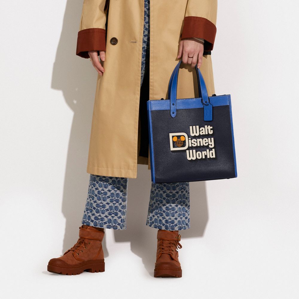 COACH®,Disney X Coach Field Tote With Walt Disney World Motif,,Detail View