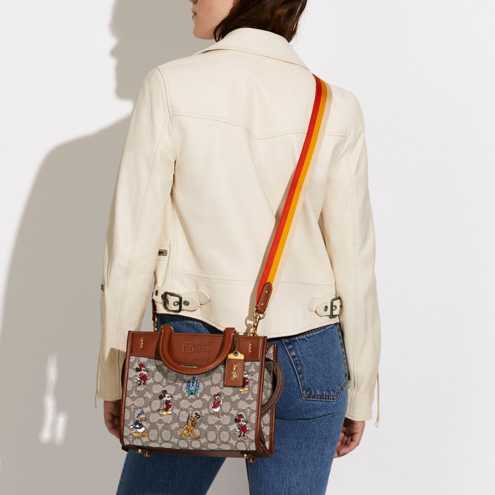 COACH®,Disney X Coach Rogue Bag 25 In Signature Textile Jacquard With Mickey Mouse And Friends Embroidery,Tote,Tag Embelli...,Brown,Detail View