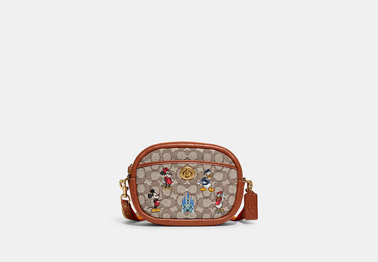 COACH®,DISNEY X COACH CAMERA BAG IN SIGNATURE TEXTILE JACQUARD WITH MICKEY MOUSE AND FRIENDS EMBROIDERY,Signatur...,Brass/Cocoa Burnished Amber Multi,Front View