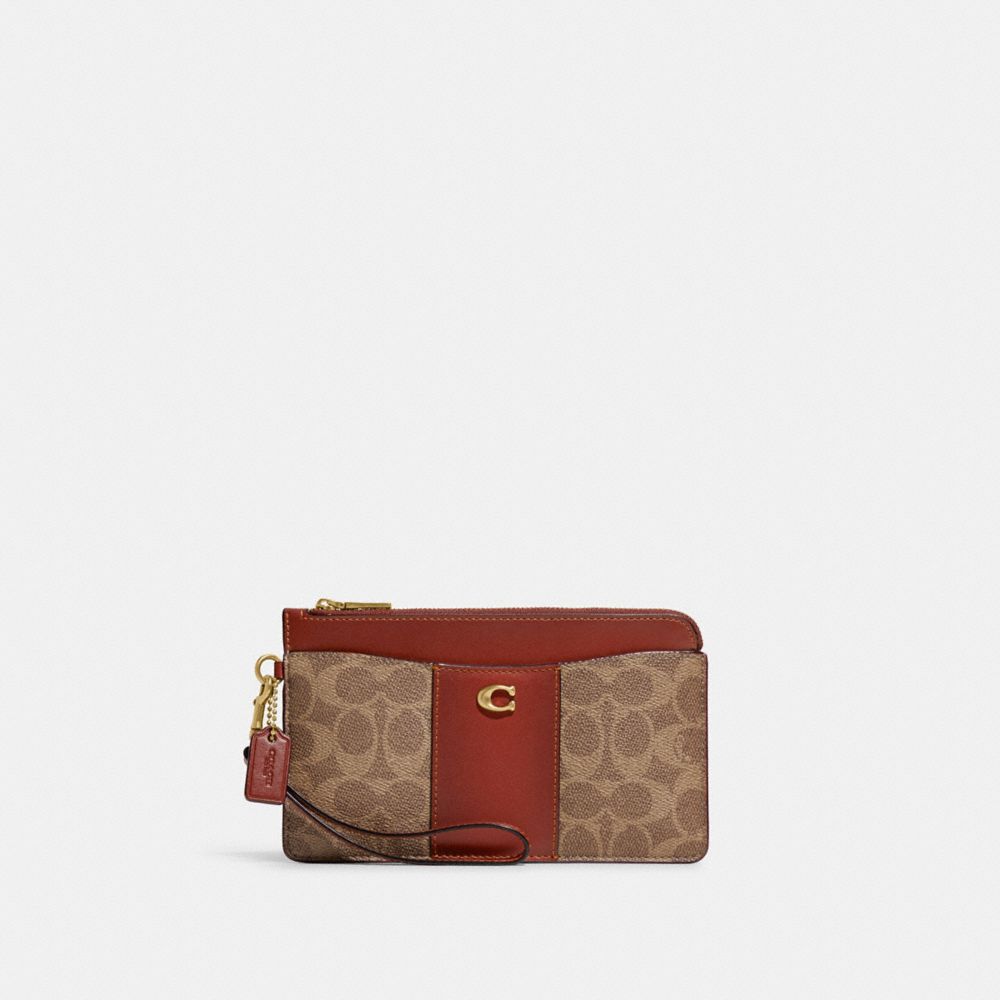 COACH® | L Zip Wristlet In Signature Canvas