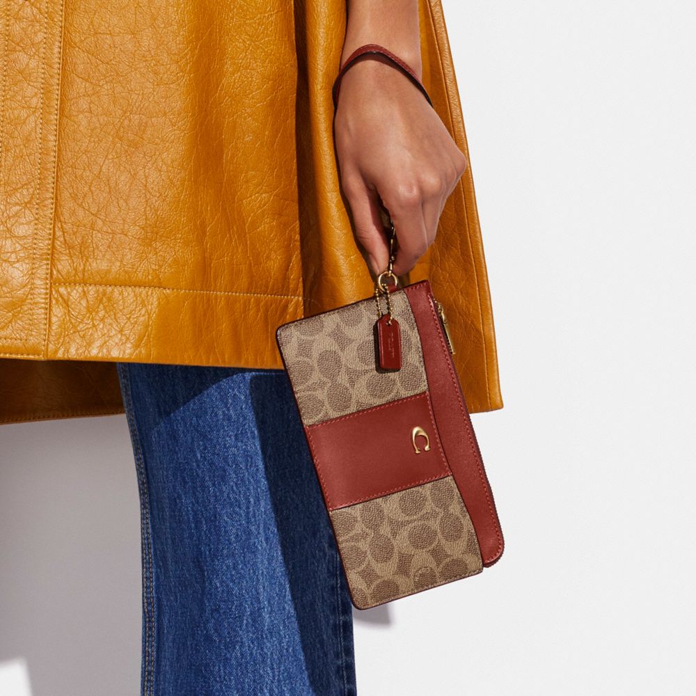 COACH® | L Zip Wristlet In Signature Canvas