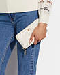 COACH®,ACCORDION ZIP WALLET WITH PILLOW QUILTING,Nappa leather,Mini,Brass/Chalk,Detail View