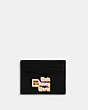 COACH®,DISNEY X COACH CARD CASE WITH WALT DISNEY WORLD MOTIF,Polished Pebble Leather,Mini,Black,Front View