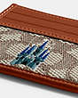 COACH®,DISNEY X COACH CARD CASE IN SIGNATURE TEXTILE JACQUARD WITH CASTLE EMBROIDERY,Signature Jacquard,Mini,Cocoa Multi,Closer View