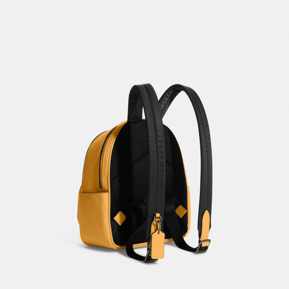 COACH®,MINI COURT BACKPACK,Pebbled Leather,Medium,Black Antique Nickel/Buttercup,Angle View