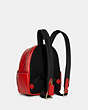 COACH®,MINI COURT BACKPACK IN SIGNATURE CANVAS,pvc,Medium,Im/Miami Red,Angle View
