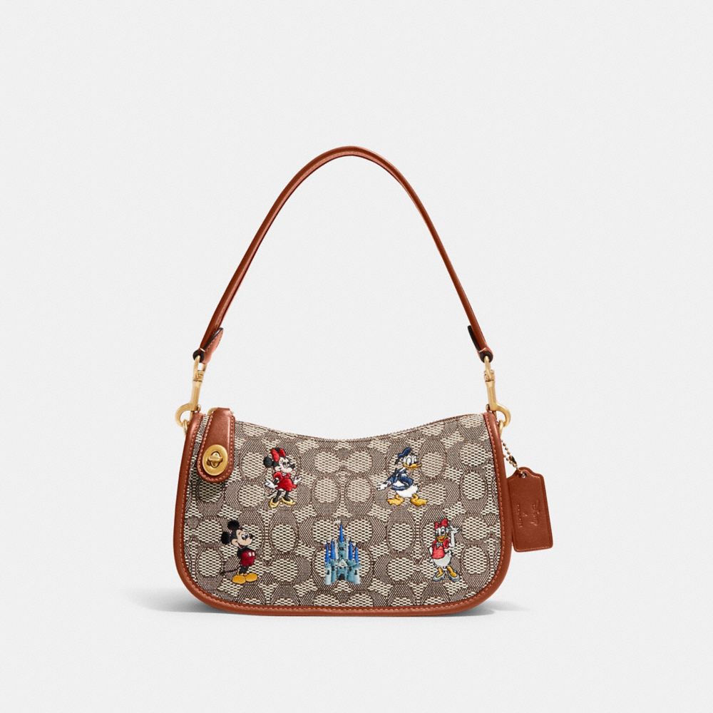 COACH® | Disney X Coach Swinger Bag In Signature Textile Jacquard 