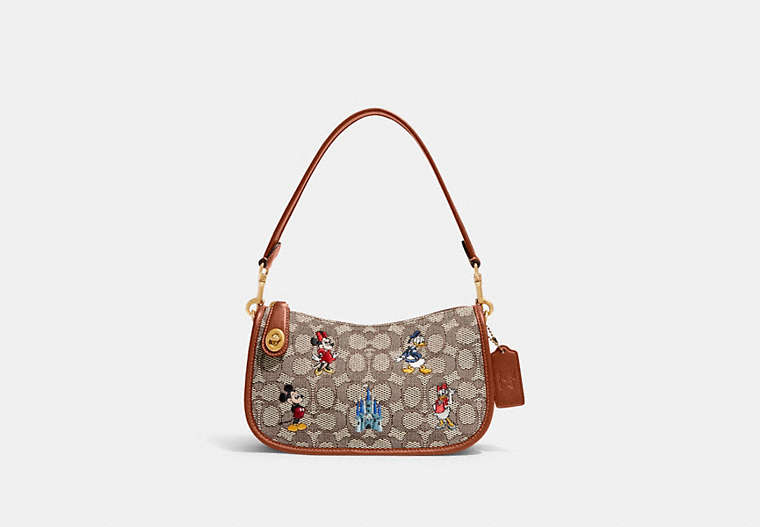 COACH®,DISNEY X COACH SWINGER BAG IN SIGNATURE TEXTILE JACQUARD WITH MICKEY MOUSE AND FRIENDS EMBROIDERY,Signatu...,Brass/Cocoa Burnished Amber Multi,Front View